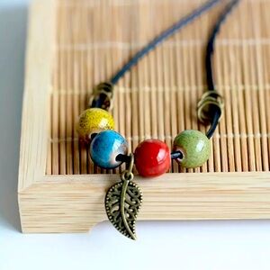 Beaded Necklace on Cord, Beads and Leaf Charm, 21”